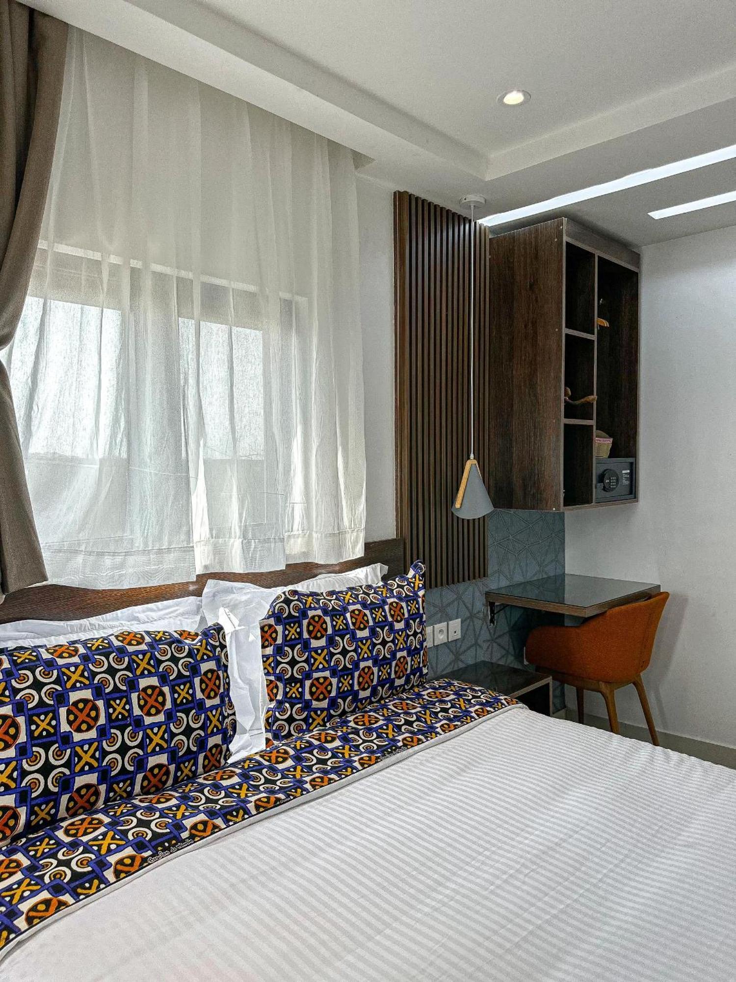 Klik Klak Appart Hotel Cotonou Esterno foto