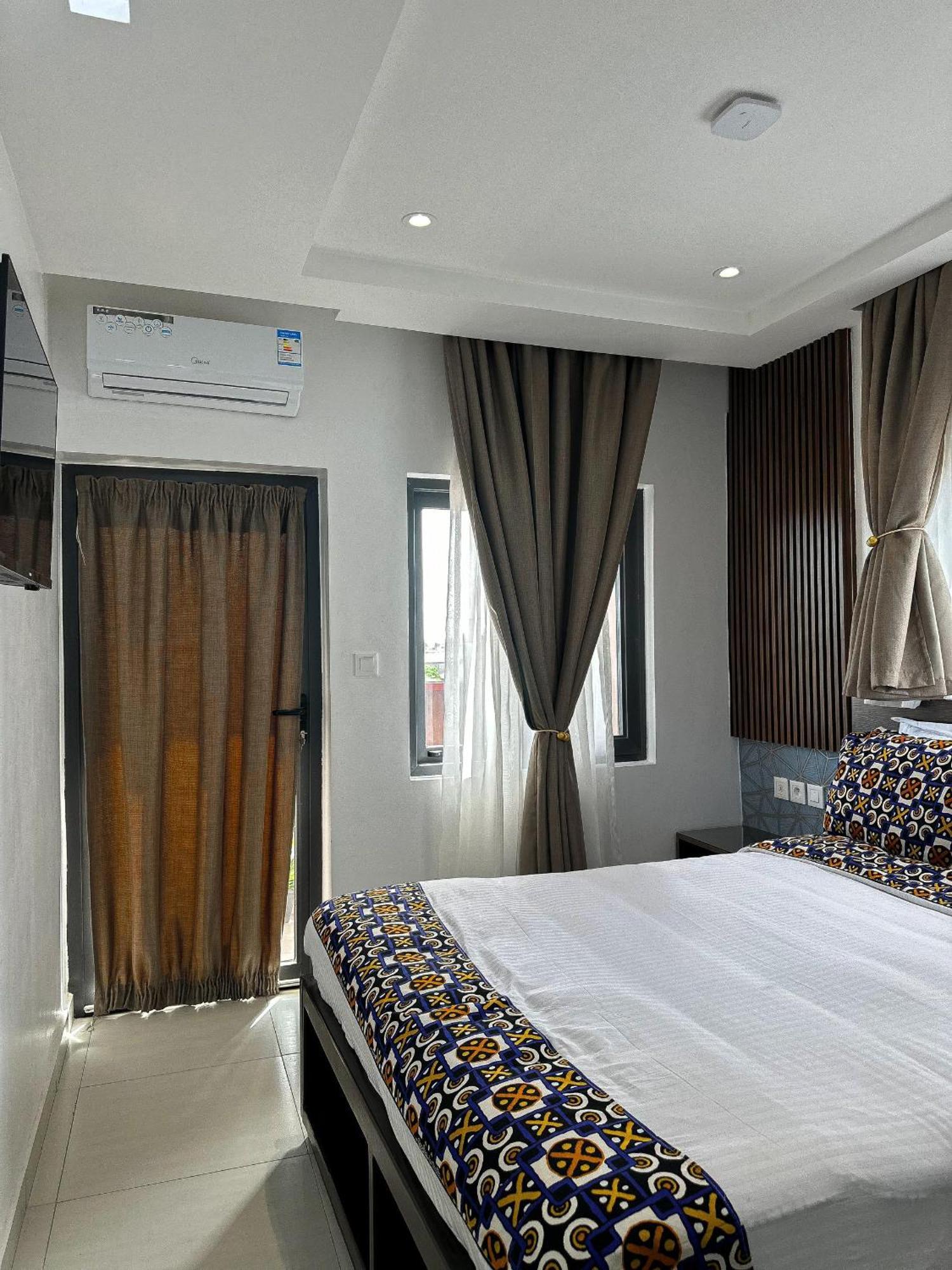 Klik Klak Appart Hotel Cotonou Esterno foto