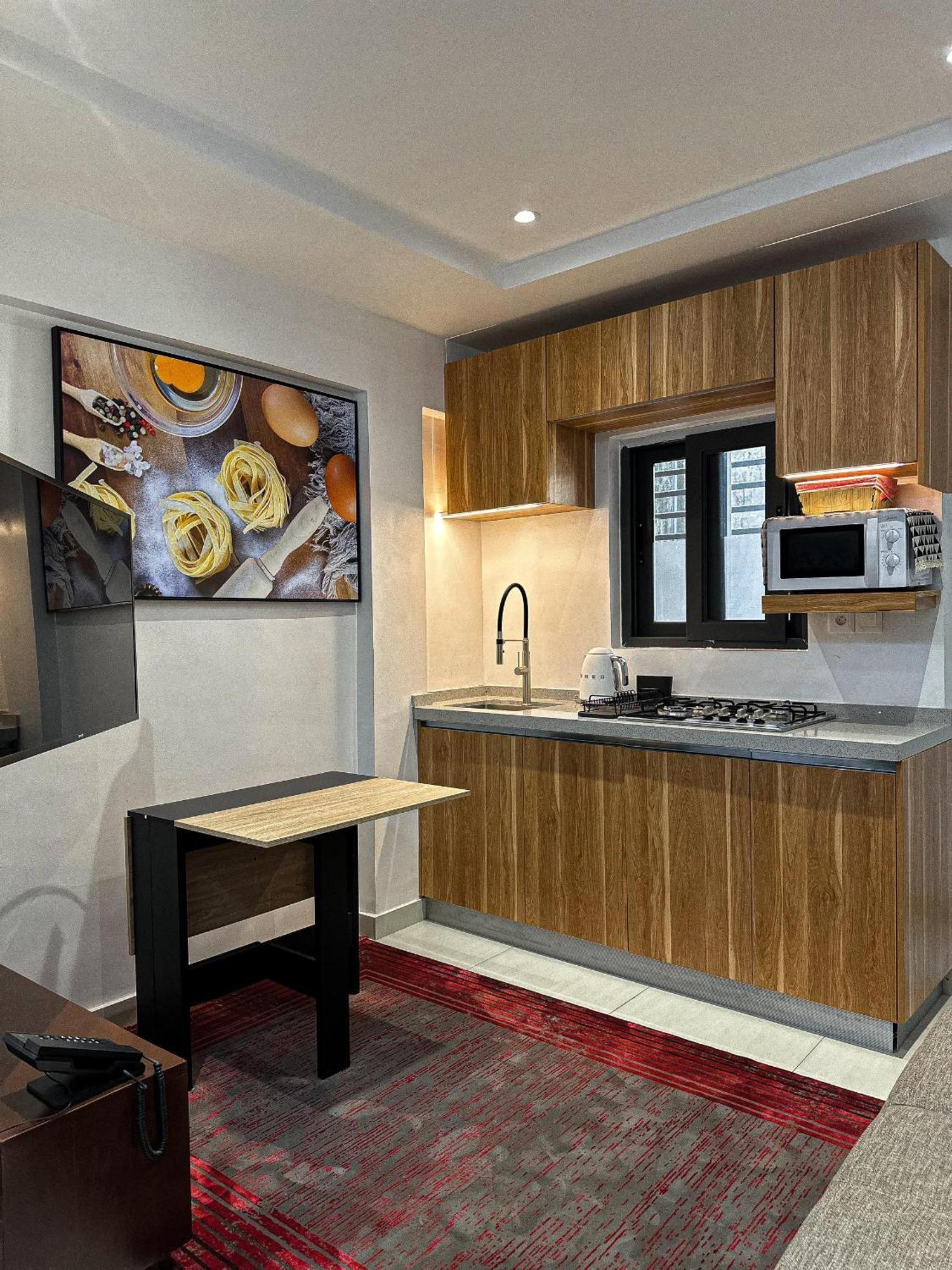 Klik Klak Appart Hotel Cotonou Esterno foto